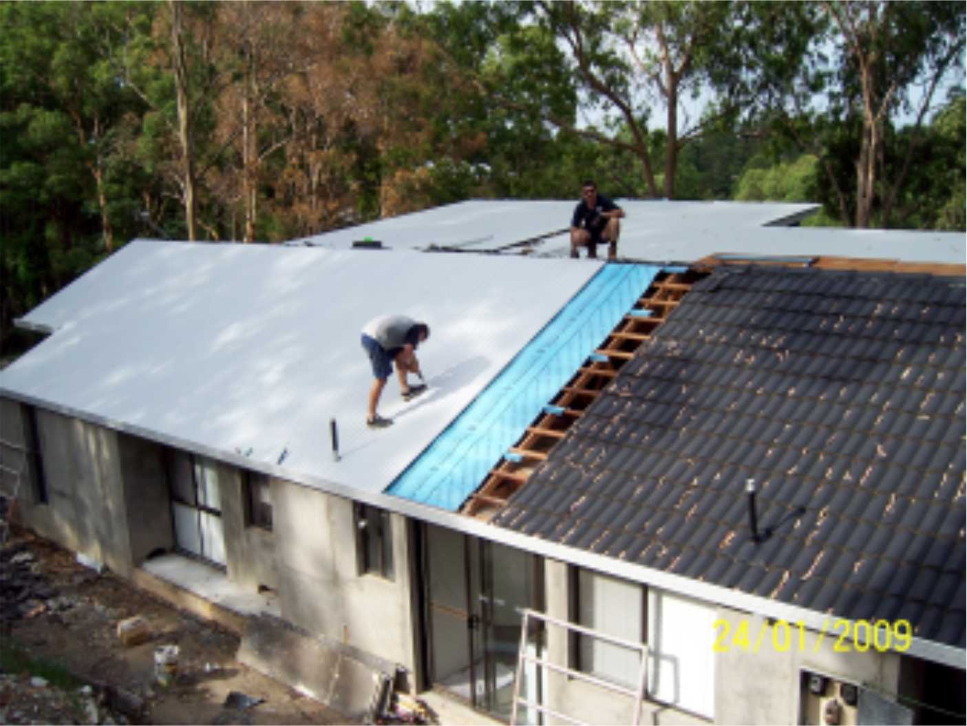re-roof from tile to metal